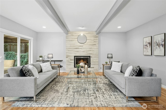 4877 167th Ave SE, Bellevue, WA 98006 - living area featuring beam ceiling, wood finished floors, a tile fireplace, baseboards, and recessed lighting
