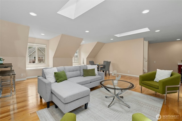 4877 167th Ave SE, Bellevue, WA 98006 - living room with a skylight, light wood-type flooring, baseboards, and recessed lighting