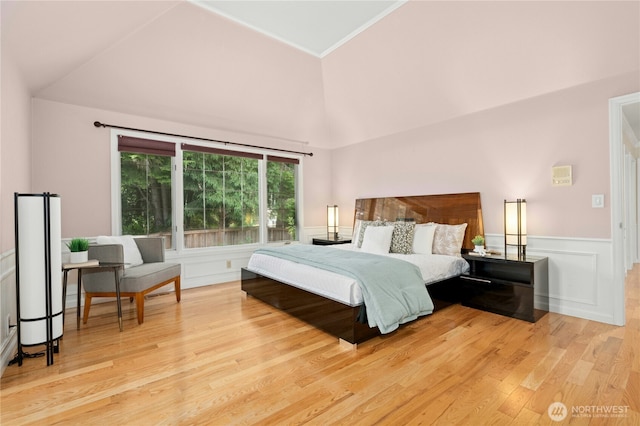 4877 167th Ave SE, Bellevue, WA 98006 - bedroom with wood finished floors, wainscoting, and high vaulted ceiling