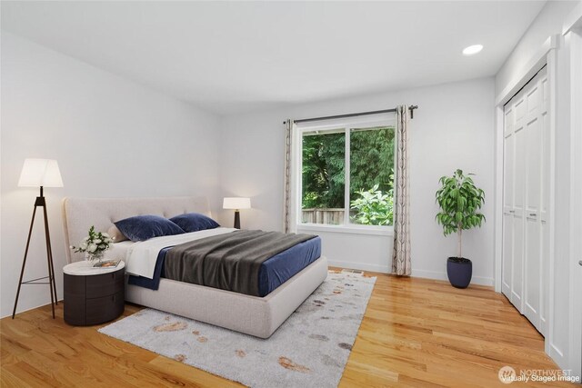 4877 167th Ave SE, Bellevue, WA 98006 - bedroom with wood finished floors, a closet, and recessed lighting