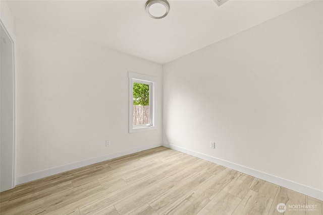 320 Kearney St, Centralia, WA 98531 - empty room featuring light wood-style floors and baseboards