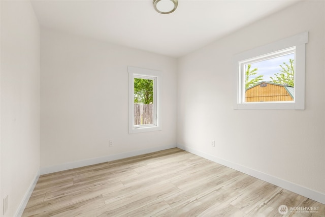 320 Kearney St, Centralia, WA 98531 - spare room with wood finished floors and baseboards