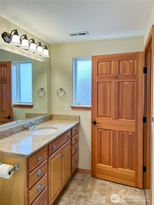 510 Oregon Ave N, Long Beach, WA 98631 - bathroom featuring vanity and baseboards