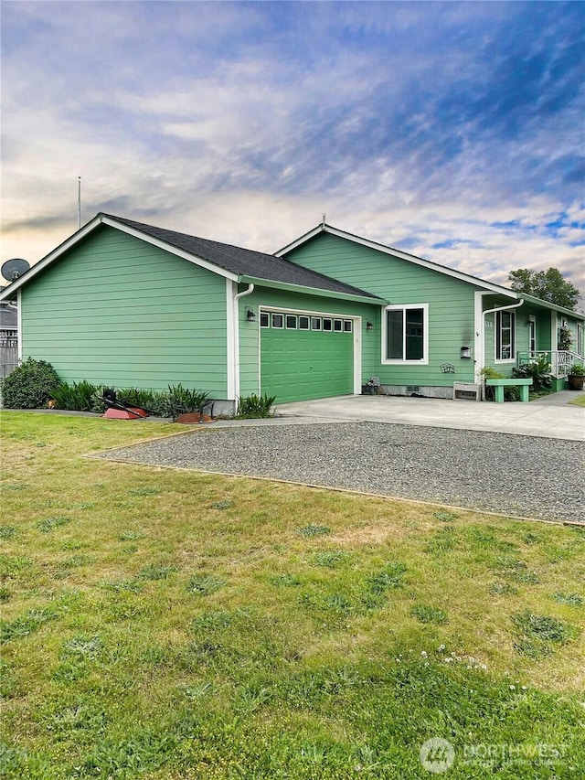 510 Oregon Ave N, Long Beach, WA 98631 - view of front of house with a garage, a front lawn, and driveway