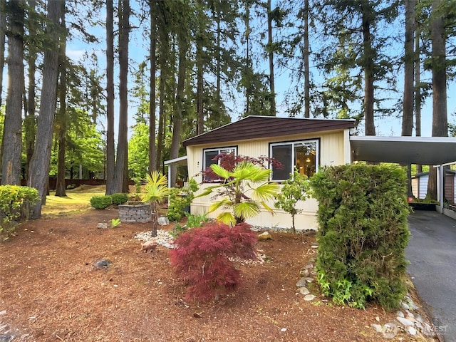 18425 NE 95th St Unit 8, Redmond, WA 98052 - view of outbuilding featuring driveway