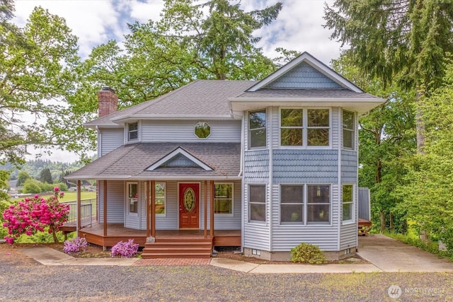187 Acorn, Longview, WA 98632 - victorian-style house featuring a chimney, covered porch, and roof with shingles
