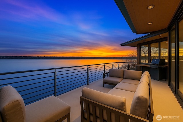 7703 W Mercer Way, Mercer Island, WA 98040 - balcony with area for grilling, a water view, and an outdoor hangout area