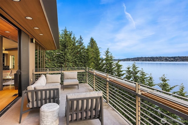 7703 W Mercer Way, Mercer Island, WA 98040 - balcony featuring a water view and an outdoor hangout area