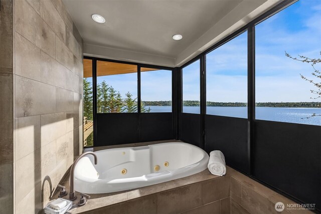 7703 W Mercer Way, Mercer Island, WA 98040 - bathroom with a water view, a tub with jets, and recessed lighting