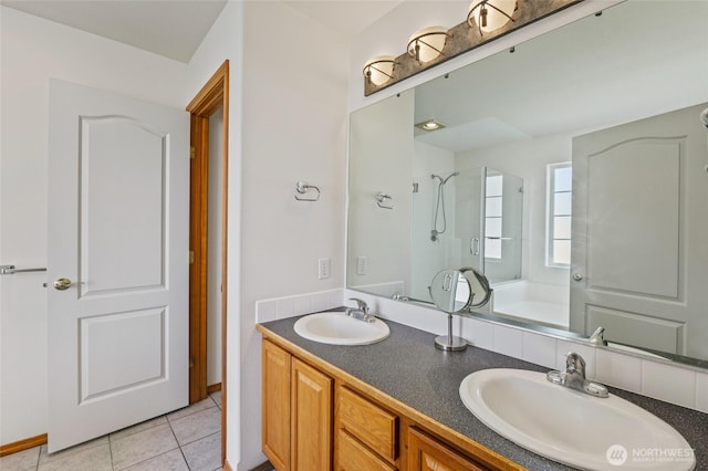 9488 SE Benjamin Way, Moses Lake, WA 98837 - bathroom with a shower, tile patterned floors, a tub, and double vanity