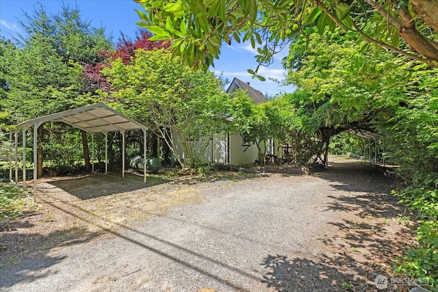 44119 Fir Rd, Gold Bar, WA 98251 - view of home's exterior with a detached carport and driveway