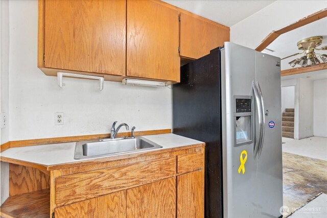 44119 Fir Rd, Gold Bar, WA 98251 - kitchen with stainless steel fridge with ice dispenser, light countertops, and ceiling fan