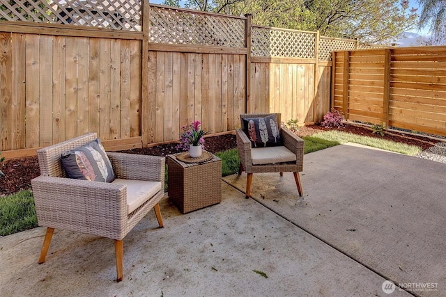 7350 21st Ave NW, Seattle, WA 98117 - fenced backyard featuring a patio area