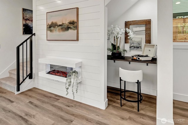 7350 21st Ave NW, Seattle, WA 98117 - corridor featuring wood finished floors and stairs