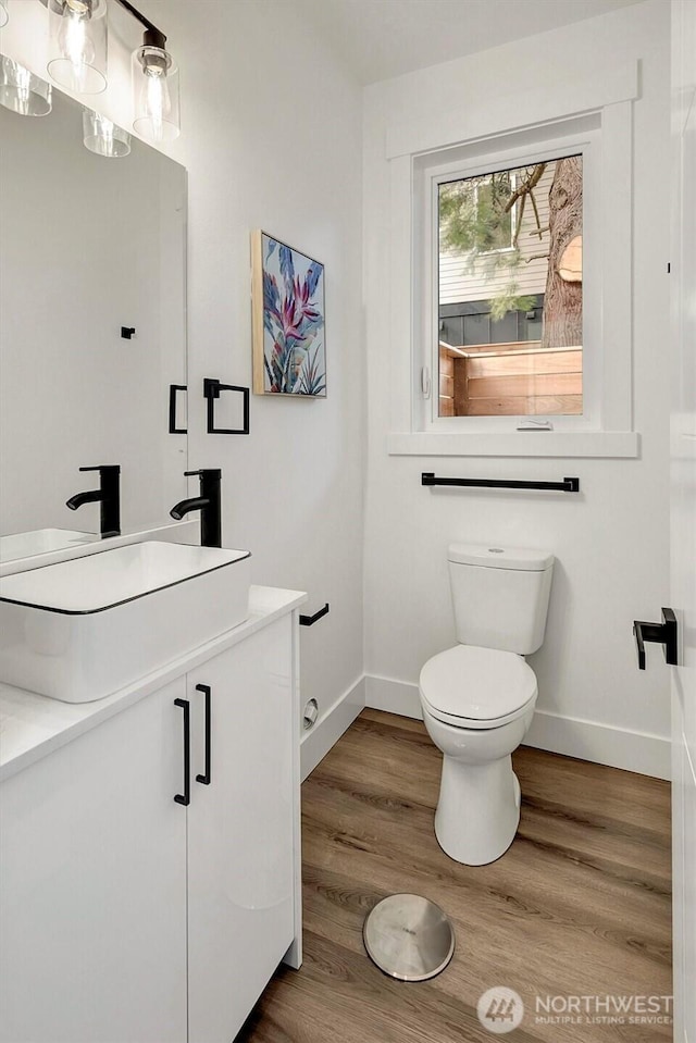 7350 21st Ave NW, Seattle, WA 98117 - bathroom with vanity and wood finished floors