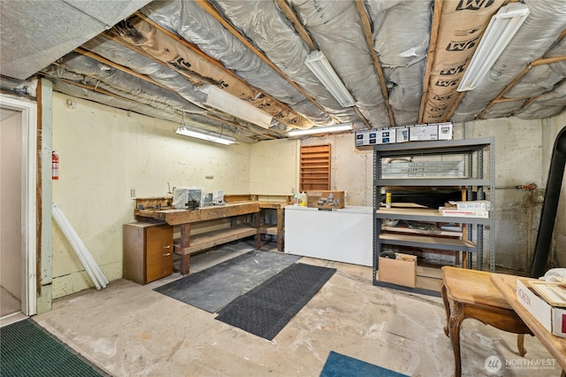 10410 260th St E, Graham, WA 98338 - unfinished below grade area featuring a workshop area