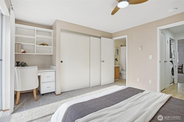260 Newport Way NW Unit C24, Issaquah, WA 98027 - bedroom with connected bathroom and ceiling fan