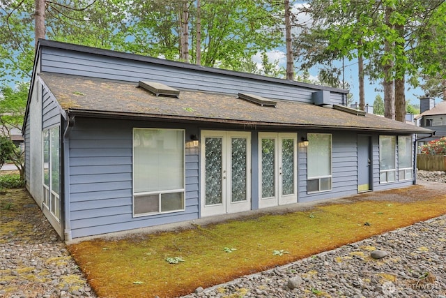 260 Newport Way NW Unit C24, Issaquah, WA 98027 - view of side of home with a shingled roof and french doors