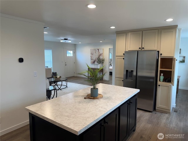 702 Bryce Pl SW, Mattawa, WA 99349 - kitchen featuring stainless steel fridge with ice dispenser, baseboards, wood finished floors, light countertops, and recessed lighting