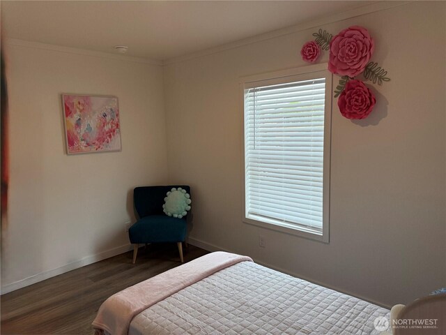 702 Bryce Pl SW, Mattawa, WA 99349 - bedroom featuring wood finished floors, baseboards, and ornamental molding