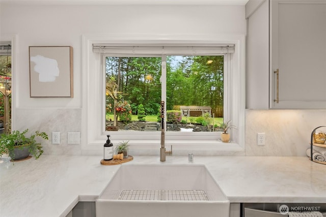 464 7th Ave, Fox Island, WA 98333 - kitchen featuring a sink, backsplash, light countertops, and dishwasher