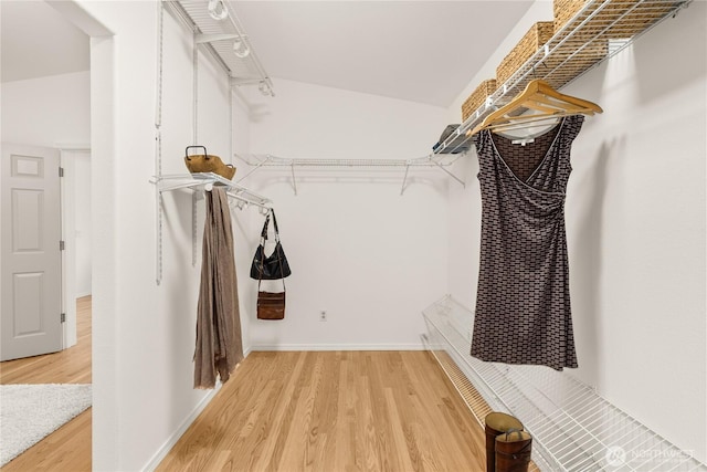 464 7th Ave, Fox Island, WA 98333 - walk in closet with light wood-type flooring