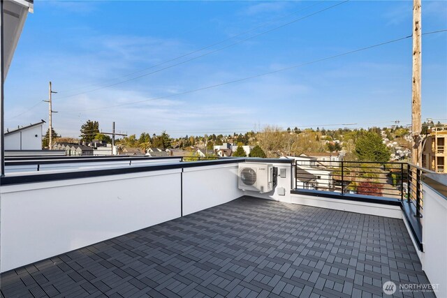 5517A 9th Ave NW, Seattle, WA 98107 - view of patio with a cooling unit and a balcony