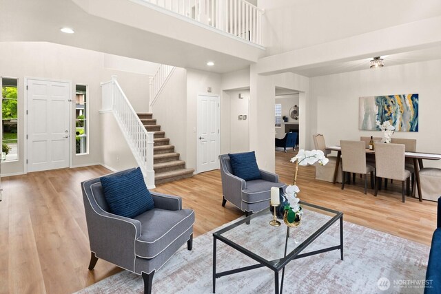1417 241st Pl SE, Sammamish, WA 98075 - living area with stairs, light wood-style flooring, and recessed lighting