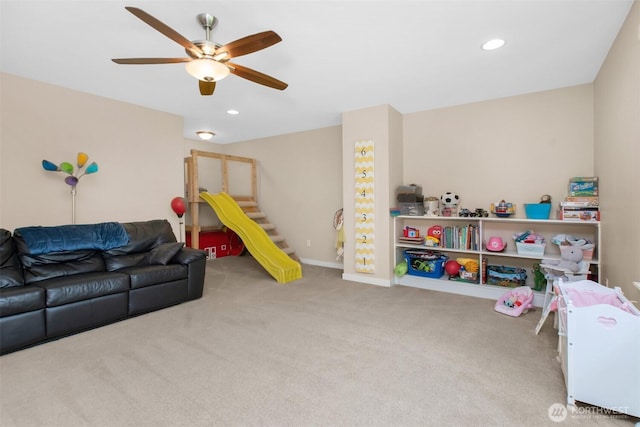 recreation room with carpet, ceiling fan, recessed lighting, and baseboards