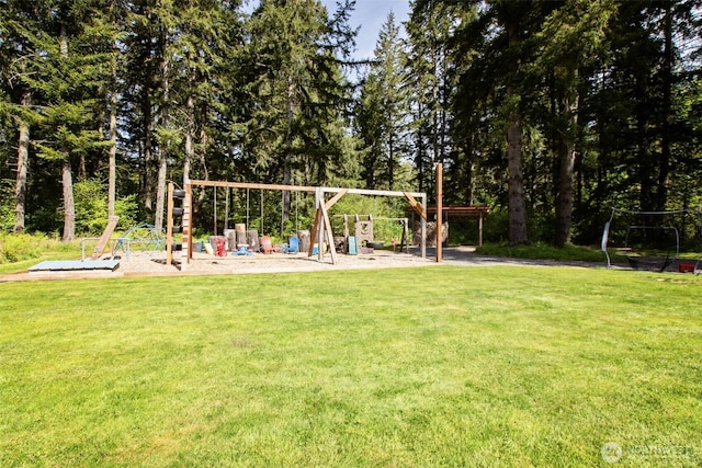 community play area featuring a lawn