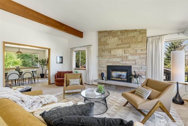4839 S Mead St, Seattle, WA 98118 - living area with beamed ceiling and a stone fireplace