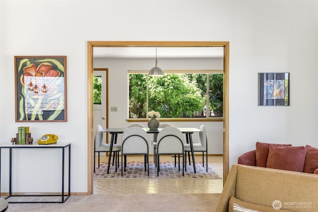 4839 S Mead St, Seattle, WA 98118 - carpeted dining room with baseboards