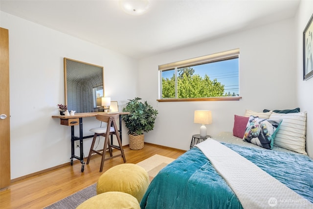 4839 S Mead St, Seattle, WA 98118 - bedroom featuring wood finished floors, baseboards, and an office area