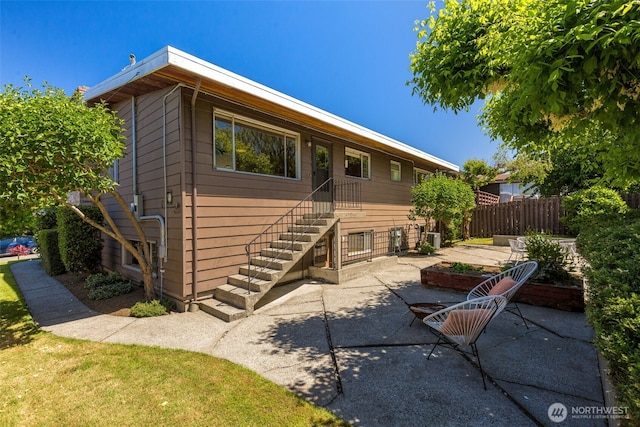 4839 S Mead St, Seattle, WA 98118 - back of property with a patio area and central AC