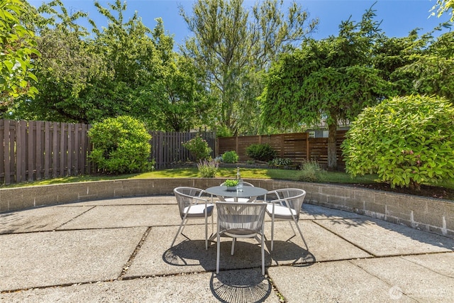 4839 S Mead St, Seattle, WA 98118 - fenced backyard featuring a patio area and outdoor dining area