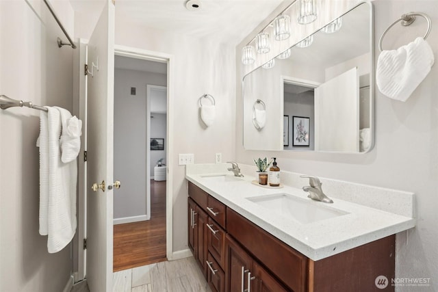 13209 Newcastle Way Unit A308, Newcastle, WA 98059 - full bathroom with double vanity and baseboards