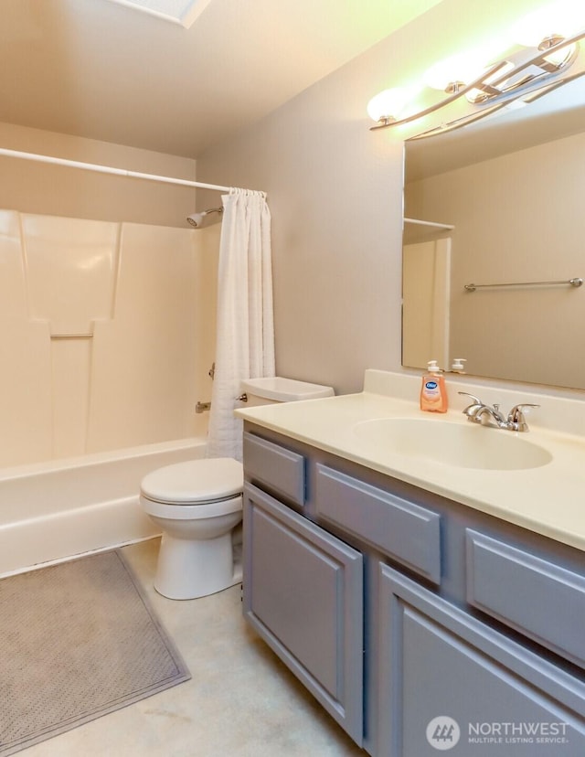full bath featuring toilet, shower / bath combination with curtain, and vanity