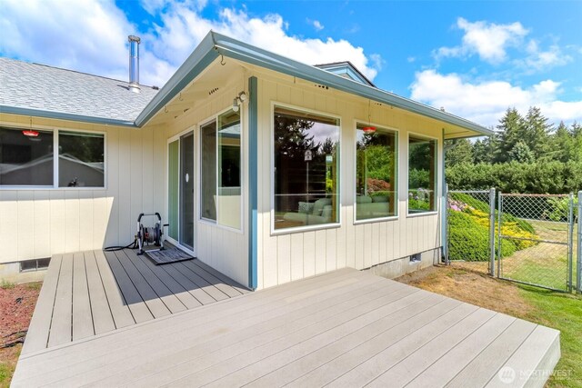 wooden deck with a gate