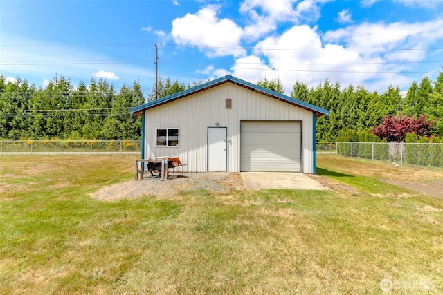 detached garage featuring driveway