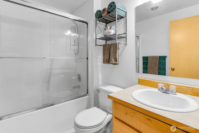 17421 73rd Ave NE, Arlington, WA 98223 - full bath featuring vanity, toilet, and bath / shower combo with glass door