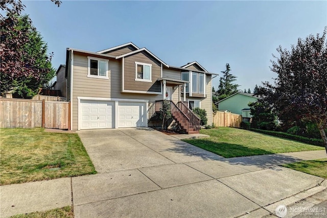 17421 73rd Ave NE, Arlington, WA 98223 - split foyer home featuring a garage and driveway
