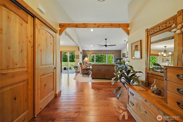 52 Buttonquail Ln, Walla Walla, WA 99362 - hall featuring plenty of natural light, beam ceiling, hardwood / wood-style flooring, recessed lighting, and a chandelier