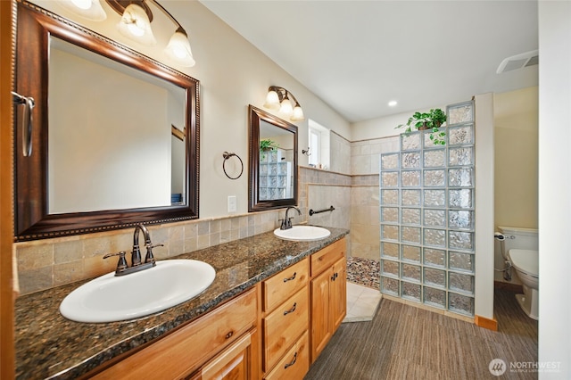 52 Buttonquail Ln, Walla Walla, WA 99362 - full bathroom with walk in shower, toilet, and double vanity
