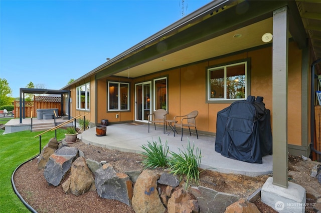 52 Buttonquail Ln, Walla Walla, WA 99362 - rear view of property featuring a patio and a lawn