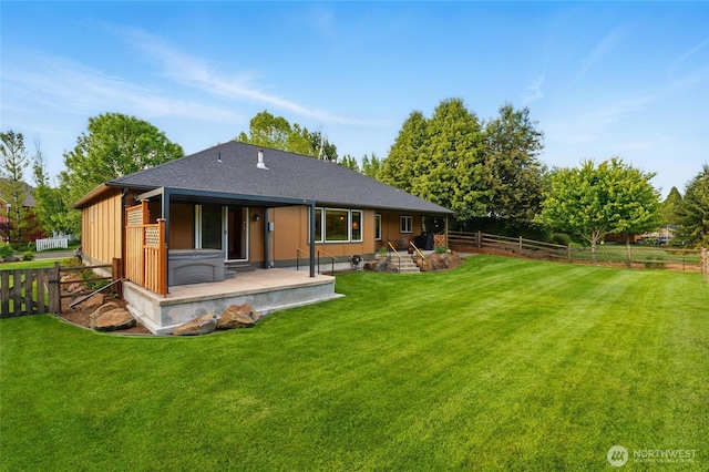 52 Buttonquail Ln, Walla Walla, WA 99362 - back of property featuring a hot tub, a patio, and roof with shingles