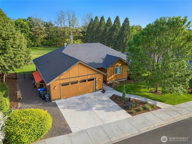 52 Buttonquail Ln, Walla Walla, WA 99362 - view of front of property featuring a garage, a front lawn, driveway, and a shingled roof
