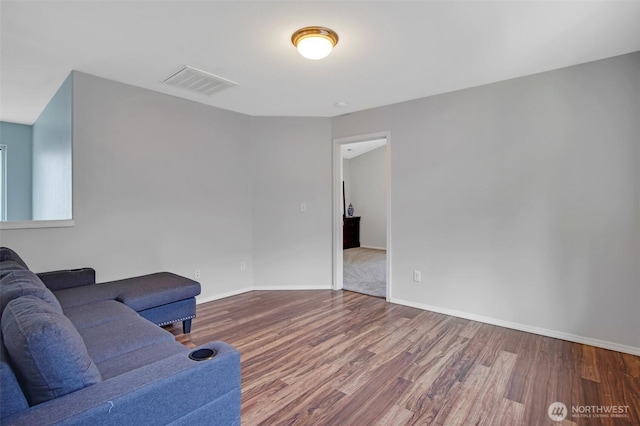 7608 181st Street Ct E, Puyallup, WA 98375 - living area featuring wood finished floors and baseboards