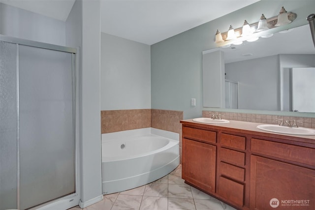 7608 181st Street Ct E, Puyallup, WA 98375 - full bath with a stall shower, a garden tub, double vanity, and marble look tiles
