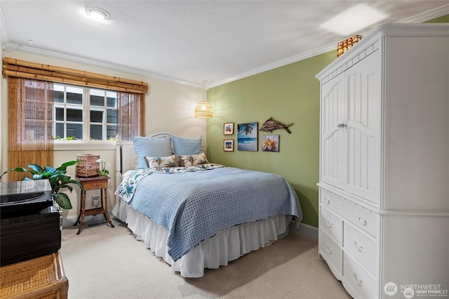 bedroom with light colored carpet, ornamental molding, and baseboards