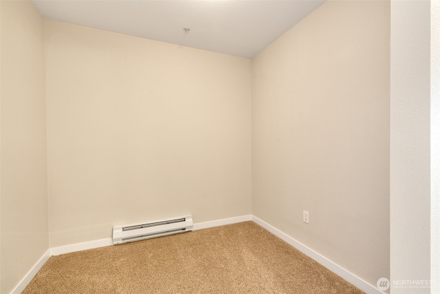 303 23rd Ave S Unit 308, Seattle, WA 98144 - unfurnished room featuring baseboard heating, light colored carpet, and baseboards